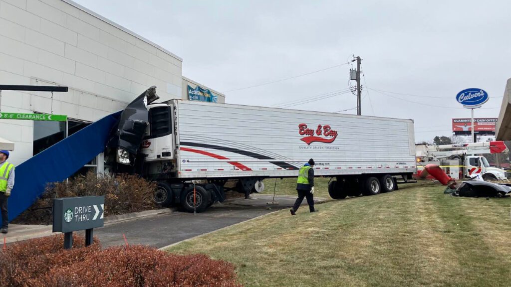 Chip Ganassi Drives a Semi Though the Humane Society
